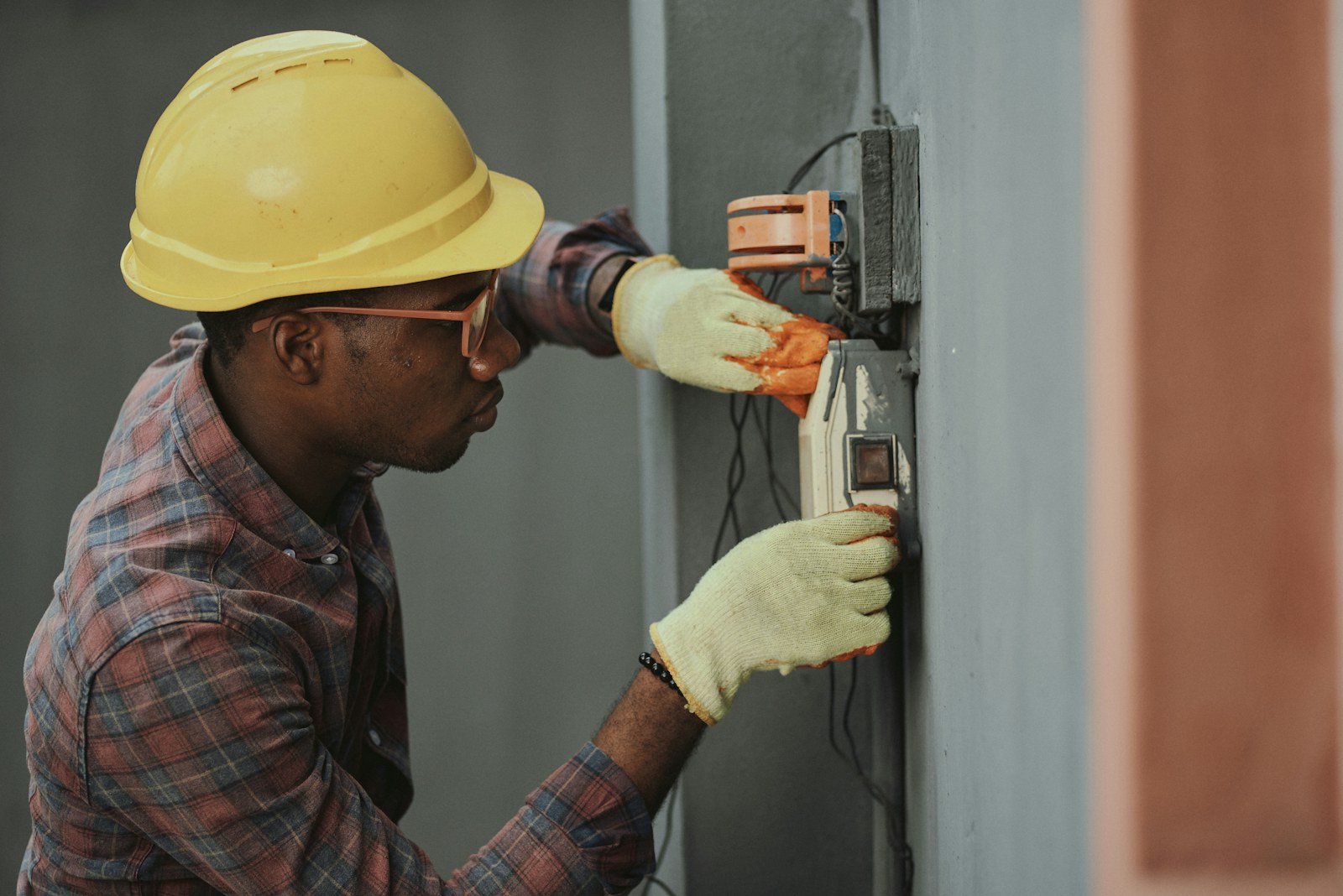 Electrical technician working with wiring